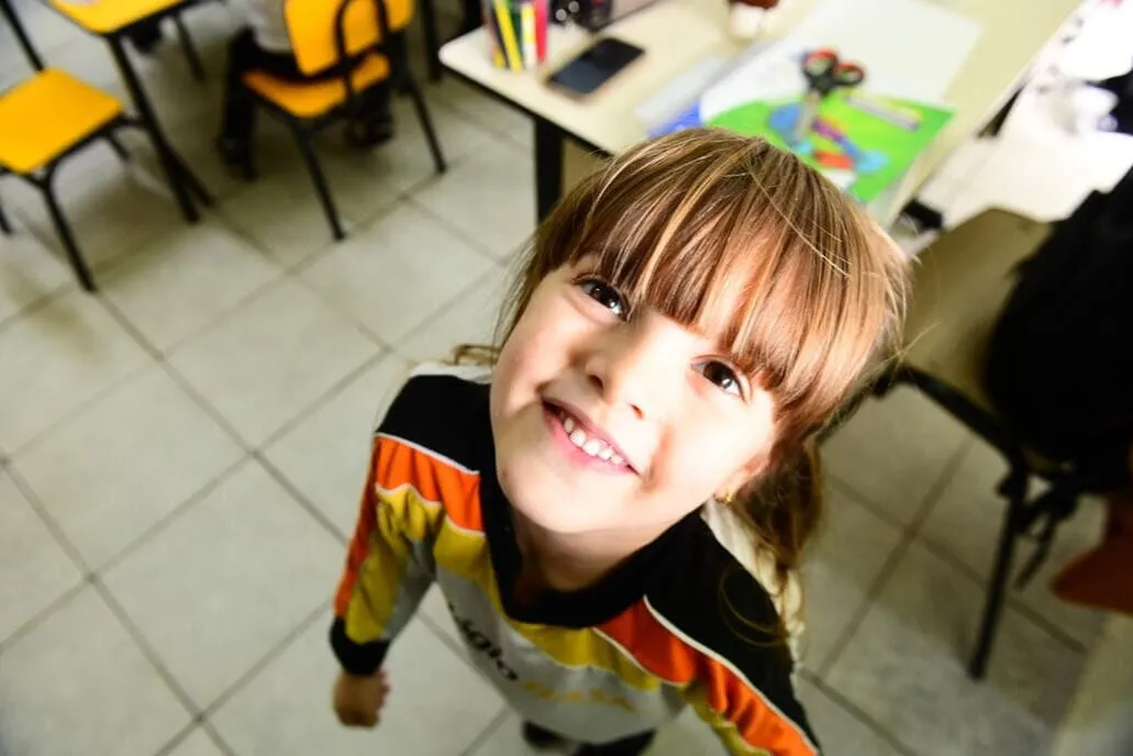 Menina sorrindo, Educação Infantil do Colégio Basic