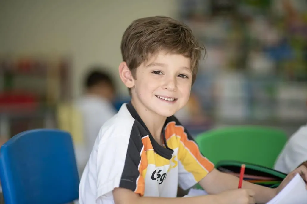 Menino sorrindo, Educação Infantil do Colégio Basic